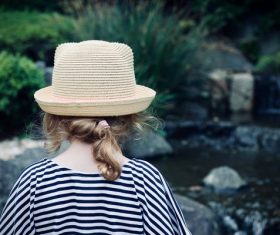 Young girl watching lake landscape Stock Photo