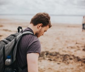 Young man by the sea Stock Photo