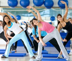 Young man doing vitality slimming exercises in the gym Stock Photo