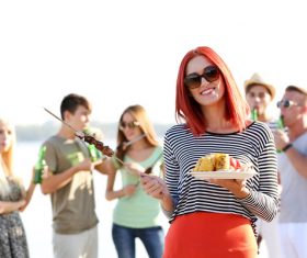 Young people at picnic party Stock Photo