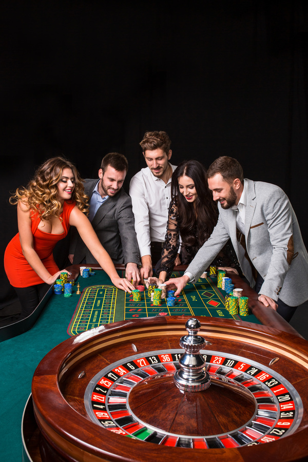 Young people playing roulette Stock Photo 01