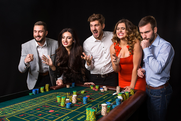 Young people playing roulette Stock Photo 03