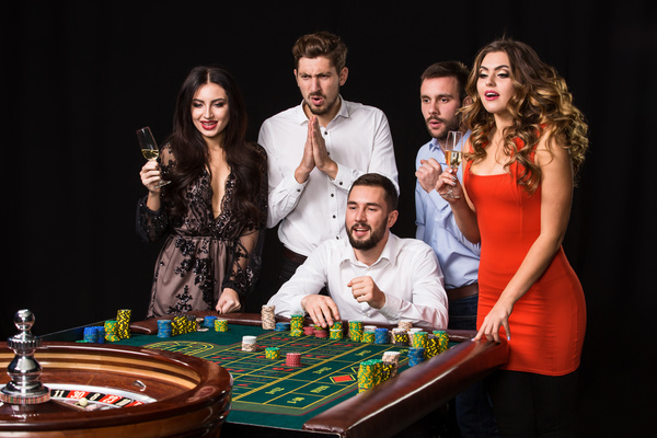 Young people playing roulette Stock Photo 05
