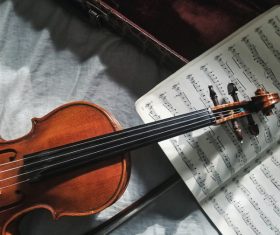 classical violin instrument and music notebook Stock Photo