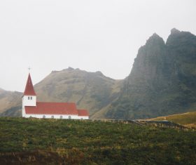 small church mountain scene Stock Photo