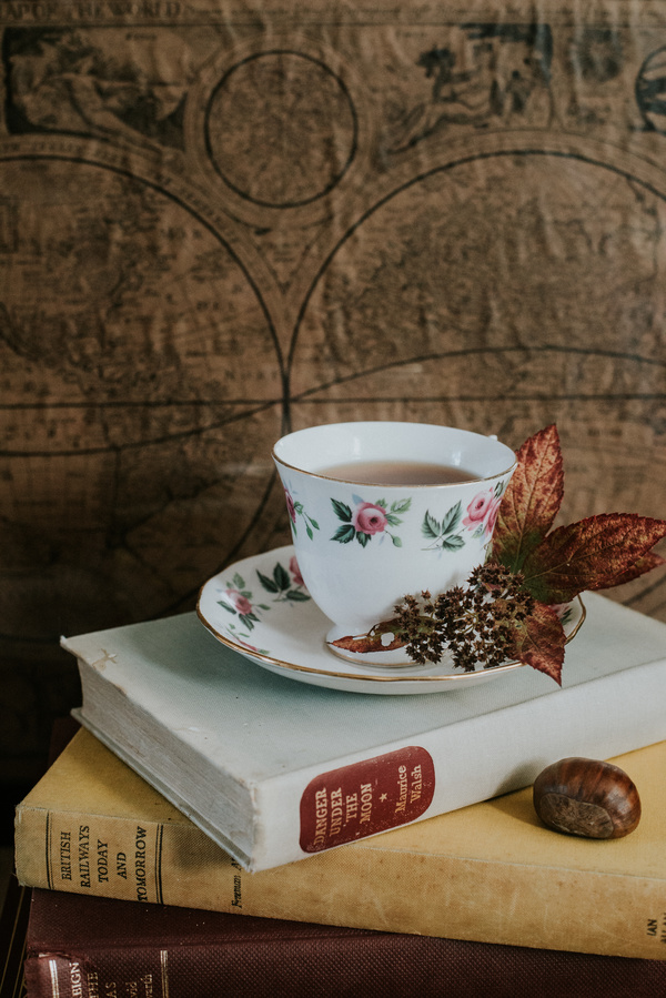 tea cup decoration on book Stock Photo