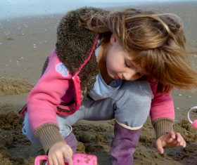 Beach little girl by the sea Stock Photo