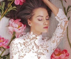 Beatutiful woman  lies among peonies Stock Photo (4)