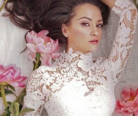 Beatutiful woman  lies among peonies Stock Photo (8)