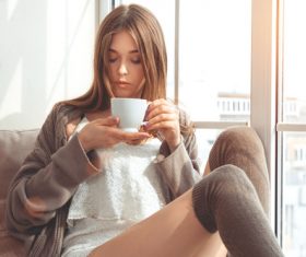 Beautiful girl drinking coffee Stock Photo