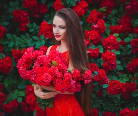 Beautiful girl in the blossoming garden Stock Photo 02