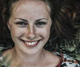 Beautiful woman with lots of freckles on face Stock Photo