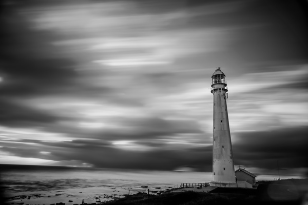 Black white picture of ancient lighthouse architecture Stock Photo