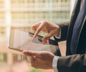 Businessman using Tablet PC Stock Photo 01