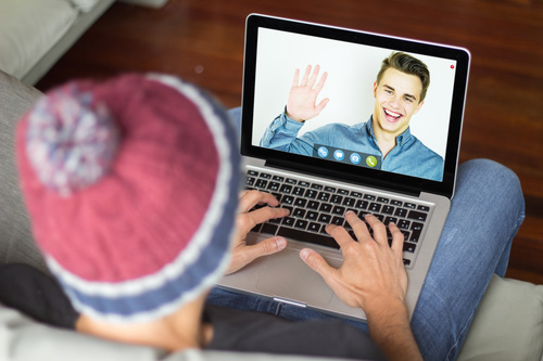Chat online with friends using laptop Stock Photo free download