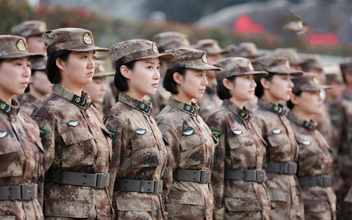 Chinese female soldier Stock Photo