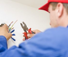 Circuit repair worker Stock Photo