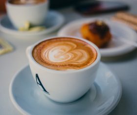 Closeup beautiful decorated coffee cup Stock Photo