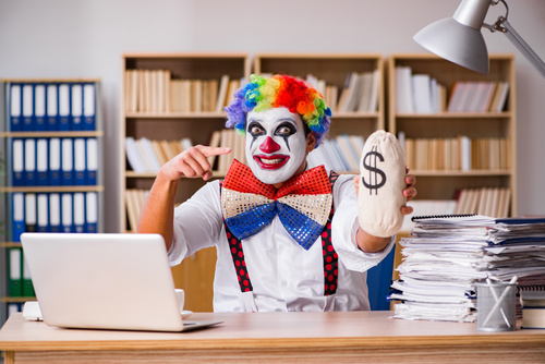 Clown in the office Stock Photo 01