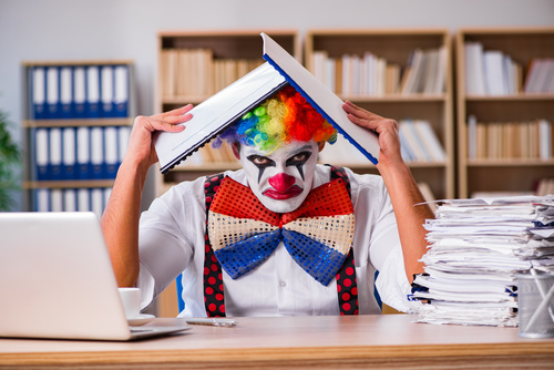 Clown in the office Stock Photo 02