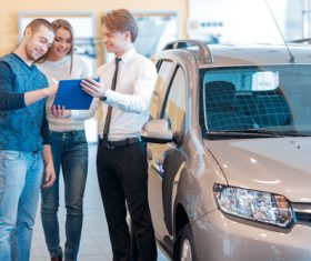 Couple buying new car Stock Photo 01
