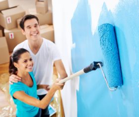 Couple new home paint Stock Photo