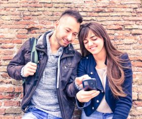 Couple using smart phones Stock Photo