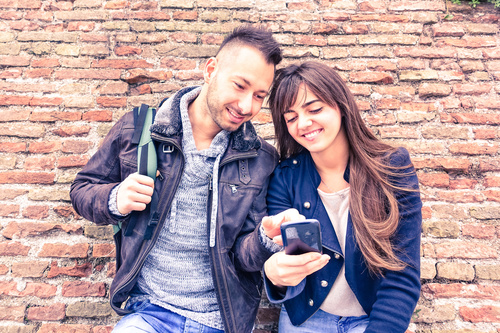 Couple using smart phones Stock Photo