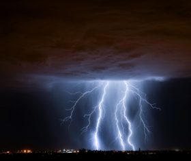 Cumulonimbus and lightning over the city Stock Photo 02