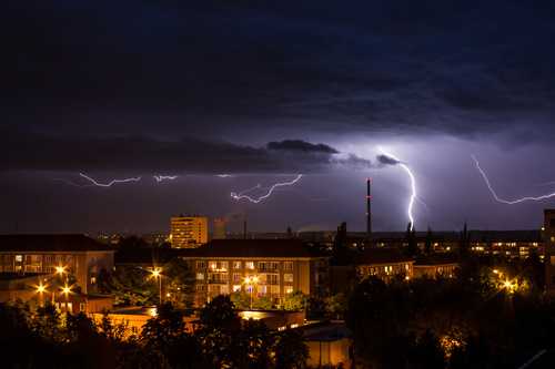 Cumulonimbus and lightning over the city Stock Photo 04