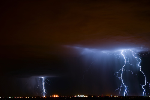 Cumulonimbus and lightning over the city Stock Photo 09