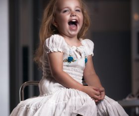 Cute little girl happy laughing Stock Photo