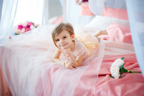 Dressed up beautiful little girl sitting on the bed Stock Photo 04 free ...