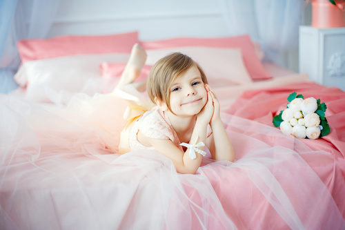 Dressed up beautiful little girl sitting on the bed Stock Photo 05 free ...