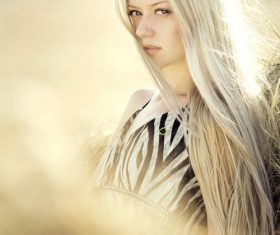 Elegant shawl blonde girl backlight photography Stock Photo