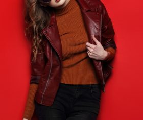 Fashion girl wearing sunglasses taking cover photo in the studio Stock Photo 04