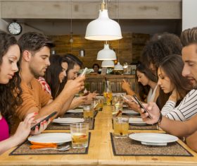 Friends party using mobile phone together Stock Photo 02