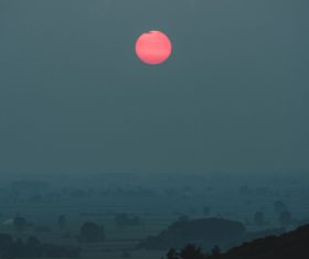 Full moon at dusk Stock Photo