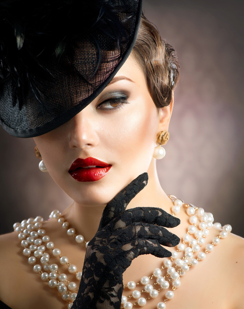 Graceful woman wearing pearl necklace Stock Photo