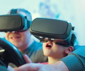 Grandpa and grandson playing games with VR Stock Photo 01
