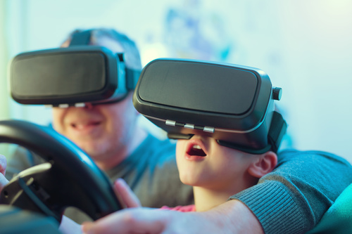 Grandpa and grandson playing games with VR Stock Photo 01