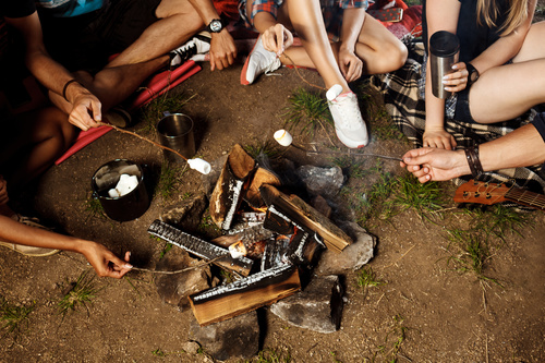 Grilling food on a campfire Stock Photo 02
