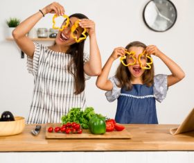 Happy mother and daughter in the kitchen Stock Photo 02