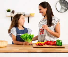 Happy mother and daughter in the kitchen Stock Photo 04
