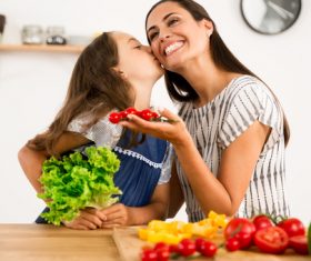 Happy mother and daughter in the kitchen Stock Photo 05