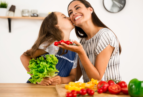 Happy mother and daughter in the kitchen Stock Photo 05