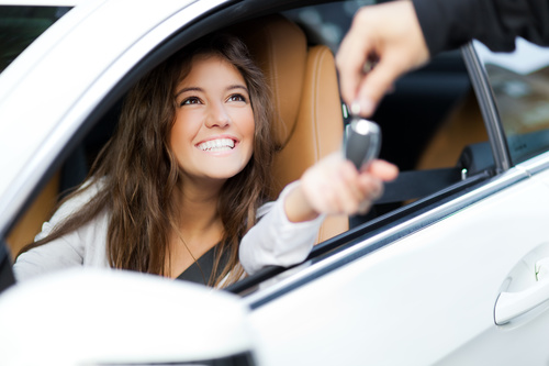 Happy woman buying new car Stock Photo 01