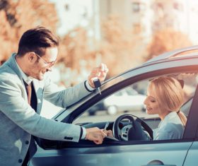 Happy woman buying new car Stock Photo 03