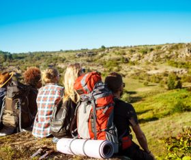 Hikers sitting down to rest Stock Photo
