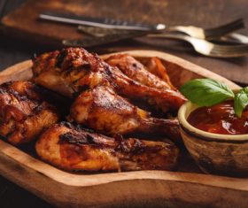 Ketchup and crispy roasted chicken legs Stock Photo 01